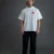 CAMISETA BOXY AQUARELA OFF WHITE