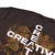 DETALHECREATIVEMARROM CAMISETA REGULAR CREATIVE MARROM